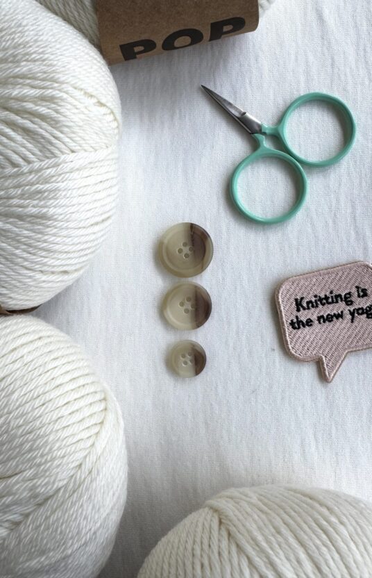Beige melert knapp